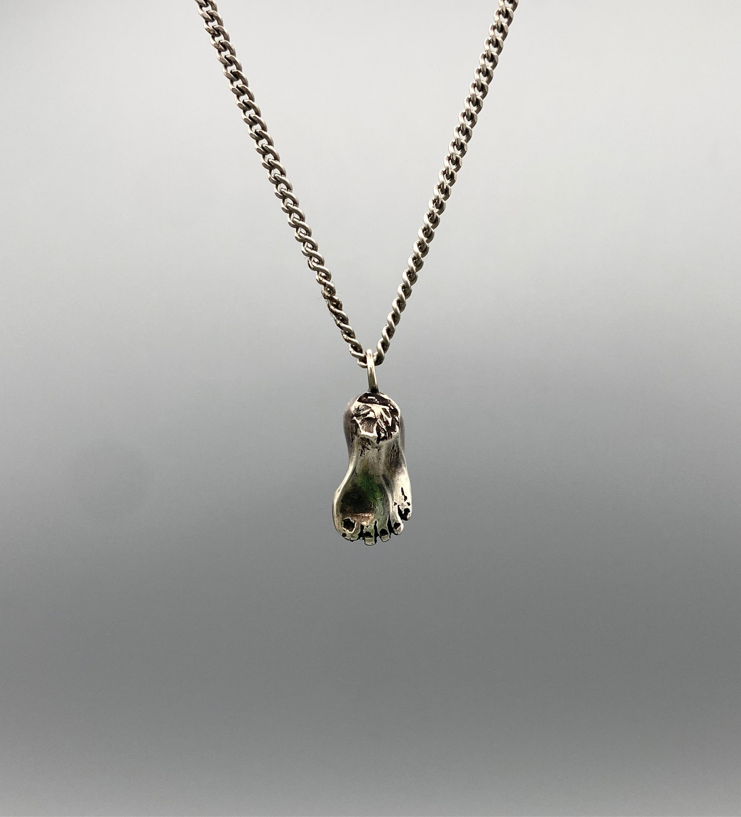 lost foot necklace